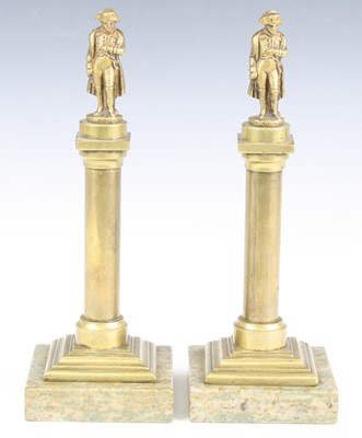 Lot 101 - A pair of desk ornaments, each in the form of...