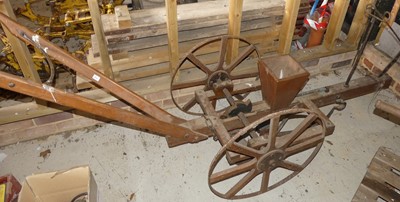 Lot 38 - A vintage wooden seed drill