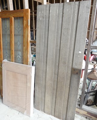 Lot 49 - A weathered oak external door (lacking...