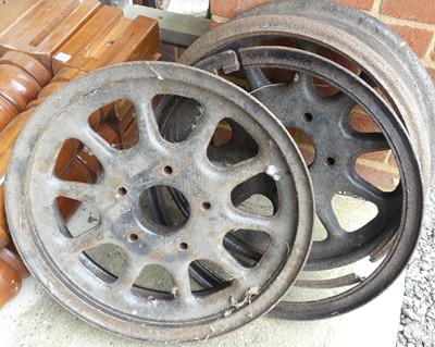 Lot 79 - A pair of vintage Dunlop car cast iron wheels,...