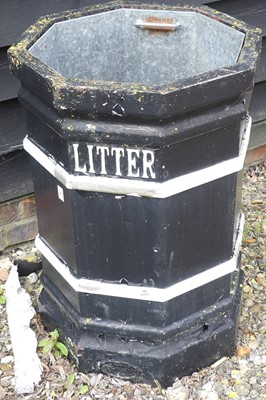 Lot 109 - A cast iron octagonal litter bin, with zinc...