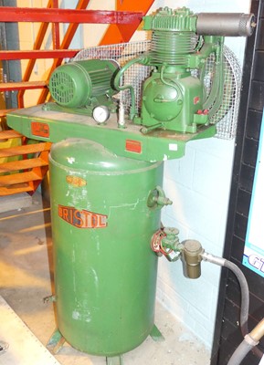 Lot 120 - A Bristol compressor, with wall-mounted air meter