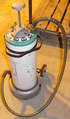 Lot 139 - A cylindrical metal fuel dispenser, on trolley...