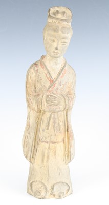 Lot 203 - A Chinese hollow moulded pottery statuette,...