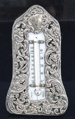 Lot 272 - An Edwardian easel desk thermometer, the...