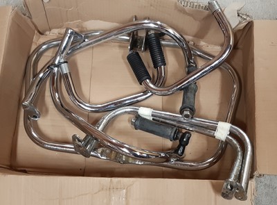 Lot 152 - A box of chrome bike parts