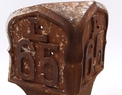 Lot 103 - Cast Iron distance marker top, to read L65,...