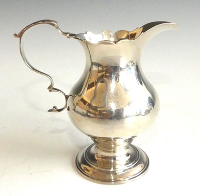 Lot 2121 - An early George III silver pedestal cream jug,...