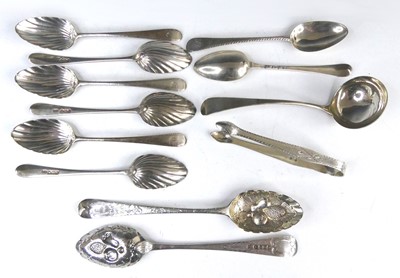 Lot 2104 - A collection of George III silver spoons by...