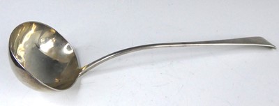 Lot 2100 - A George III silver soup ladle, in the old...