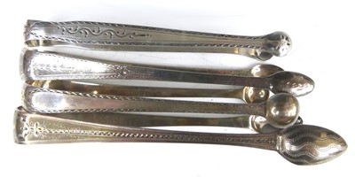 Lot 2129 - Four pairs of George III silver sugar bows,...