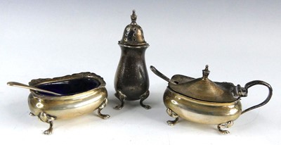 Lot 2195 - A George VI silver three-piece cruet set,...