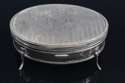 Lot 352 - A large George V silver trinket box of oval...