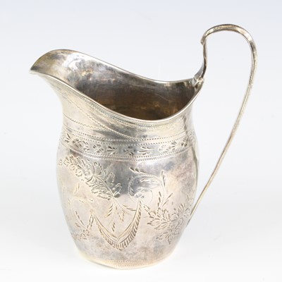 Lot 263 - A George III silver cream jug of helmet shape,...