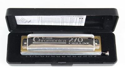 Lot 674 - An M. Hohner German Super Chromonica 270...