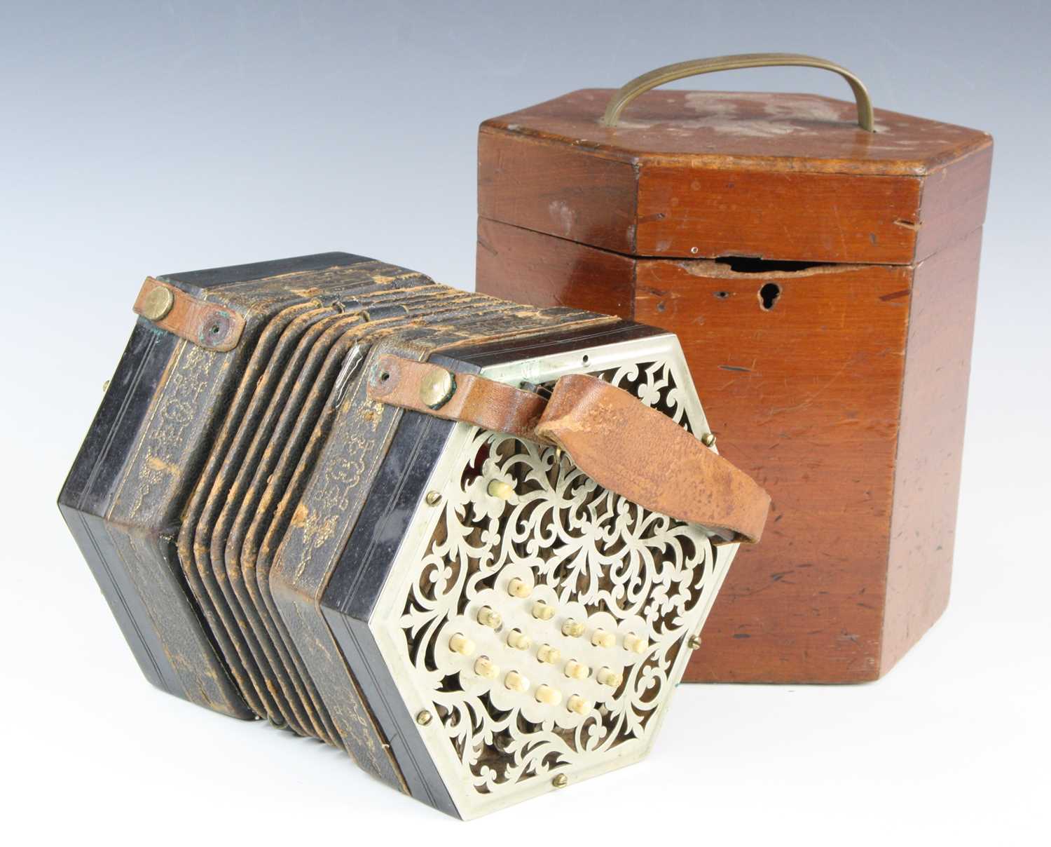 Lot 697 - A 19th century concertina, of typical...