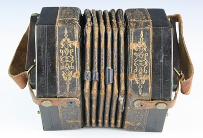 Lot 697 - A 19th century concertina, of typical...