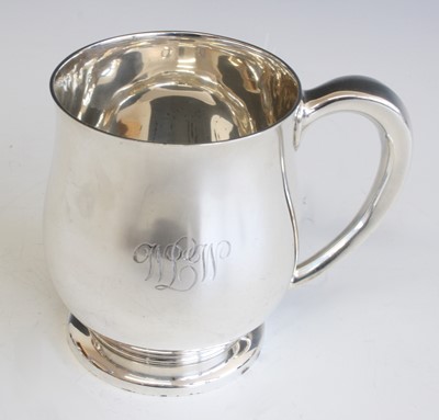 Lot 2194 - A George VI silver tankard, of plain baluster...