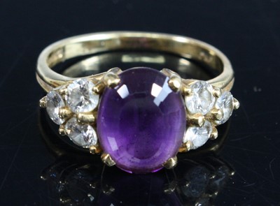 Lot 401 - An 18ct yellow gold, amethyst and diamond ring,...