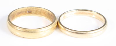 Lot 407 - Two wedding rings, being an 18ct yellow gold 3....