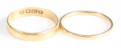 Lot 408 - Two 22ct gold wedding bands, being a 4mm...