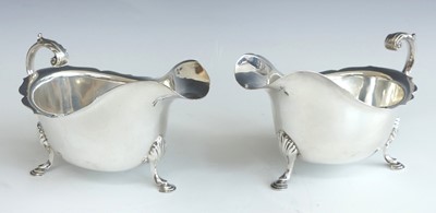 Lot 140 - A pair of Art Deco period silver sauceboats,...