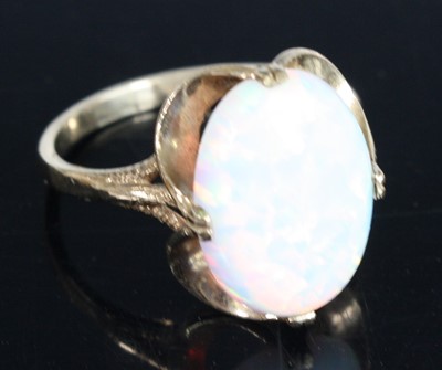 Lot 411 - A 9ct yellow gold and synthetic opal dress...