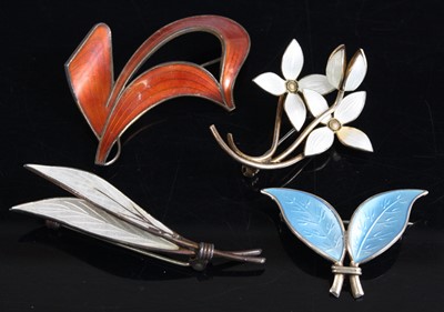 Lot 417 - Four assorted enamel brooches, comprising a...