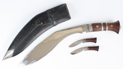 Lot 150 - A tourist kukri, having a 31cm curved steel...