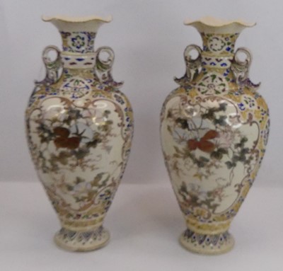 Lot 12 - A pair of Japanese satsuma vases, each of twin...