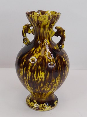 Lot 16 - A Victorian art pottery mottled brown and...