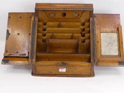 Lot 23 - A Victorian light oak stationery box, the...