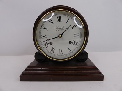 Lot 42 - A reproduction mahogany drumhead mantel clock,...