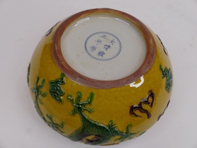 Lot 43 - A Chinese yellow glazed porcelain bowl, of...