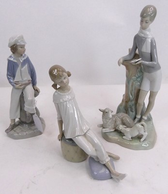 Lot 64 - A Lladro porcelain figure of a lady standing...