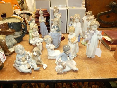 Lot 114 - A collection of fourteen Lladro porcelain...