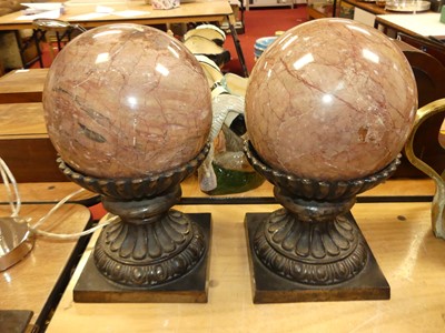 Lot 123 - A pair of polished hardstone spheres, each dia....