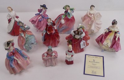 Lot 130 - A collection of eleven Royal Doulton figures,...