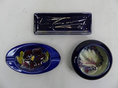 Lot 213 - A Moorcroft Anemone pattern ashtray, w.16cm;...