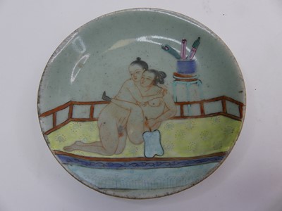 Lot 217 - A Chinese celadon glazed dish, enamel...