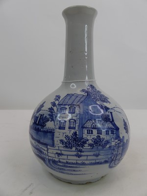 Lot 218 - An 18th century blue and white Delft bottle...