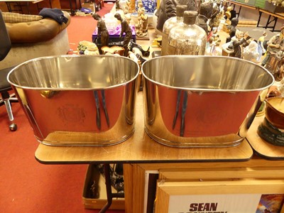 Lot 171 - A pair of plated metal champagne buckets, each...