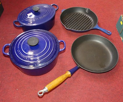 Lot 180 - A collection of Le Creuset blue enamel cookwares