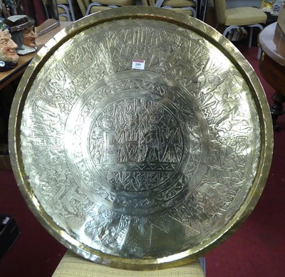 Lot 189 - An eastern circular brass tray, dia. 69cm