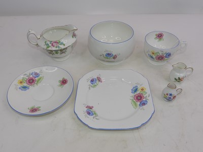 Lot 244 - A Shelley floral pottery tea service, together...