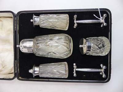 Lot 263 - A cased cut glass and silver mounted table...