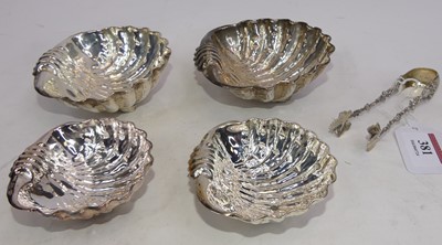 Lot 381 - A set of four shell shaped dishes, each...