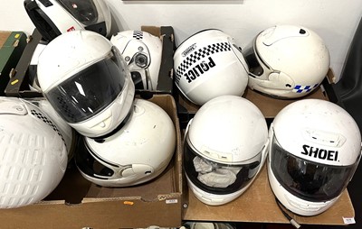 Lot 633 - A collection of motorcycle helmets, to include...