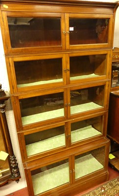 Lot 1150 - A 1920s mahogany five-tier stacking bookcase,...