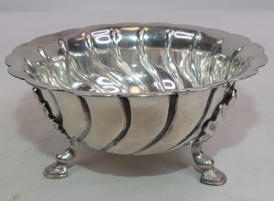 Lot 396 - A Victorian silver bowl, standing upon three...